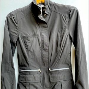 Travel jacket. Zip & snap. 92 poly, 8% elastase. Fits small 4